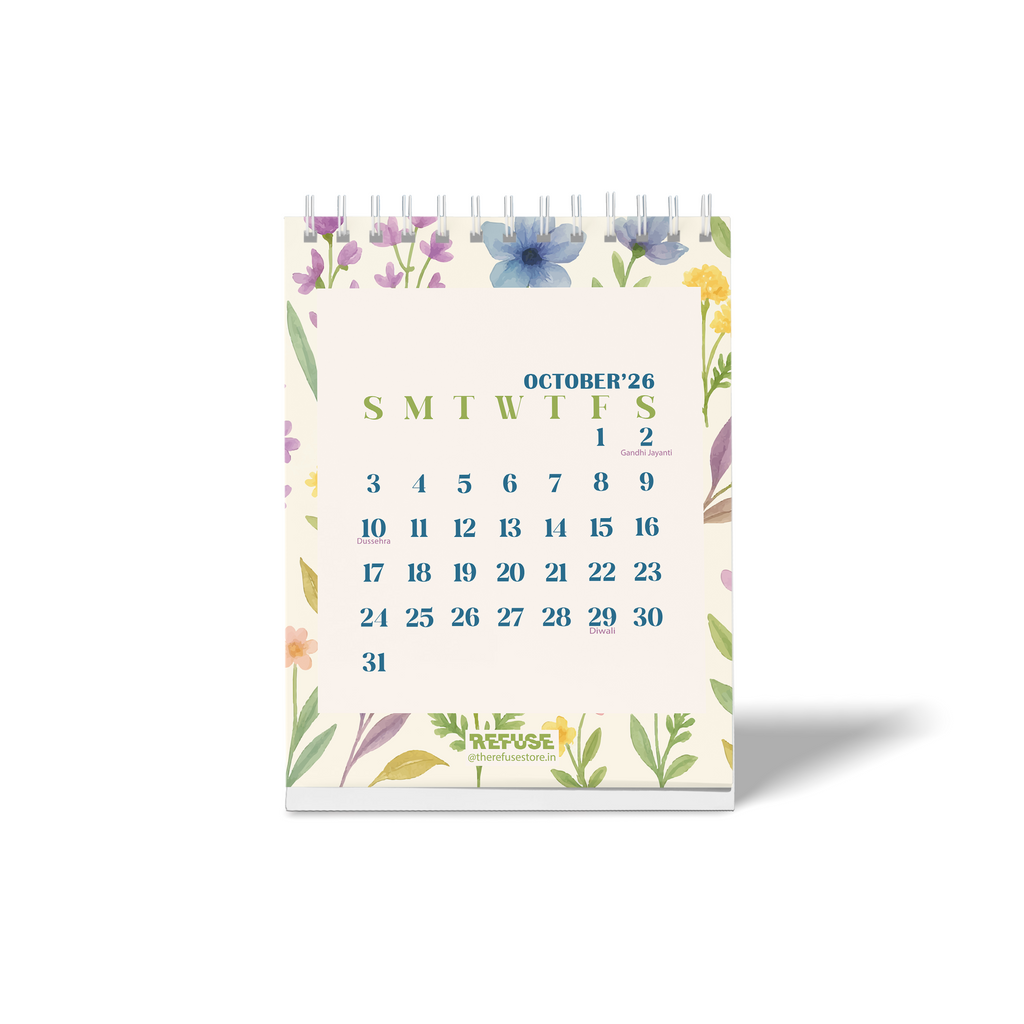 Personalised 2027 floral desk calendar featuring a monthly calendar layout, colourful botanical illustrations, and Indian festival dates.