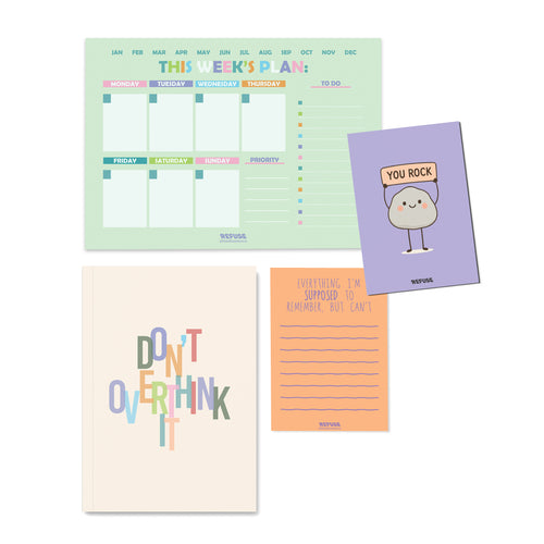 Stationery gift set featuring a colourful weekly planner pad, motivational notebook, lined notepad, and illustrated greeting card for planning, journaling, and everyday notes.
