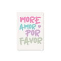 Colorful “More Amor Por Favor” text on a off-white notebook cover.