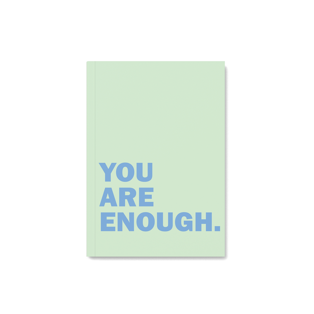Green Notebook with quote you are enough in blue